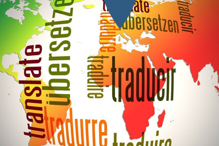 Bunte Weltkarte mit dem Wort "Übersetzen" in verschiedenen Sprachen